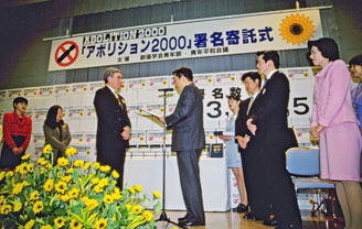 Soka Gakkai volunteers, mainly youth, collected some 13 million signatures for the global antinuclear campaign, Abolition 2000.